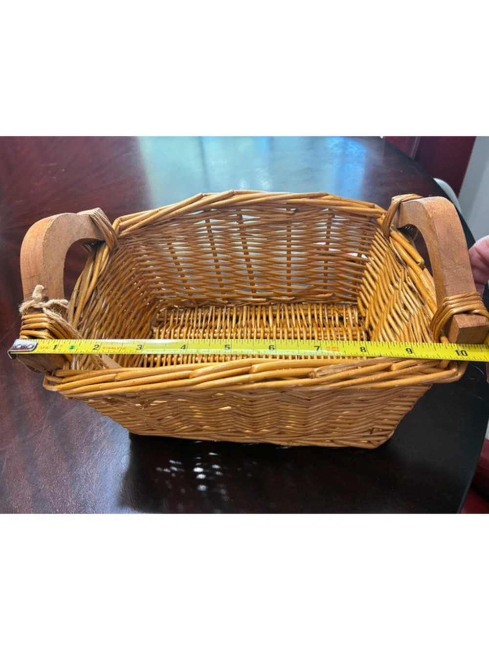 Vintage home interior woven basket with wood handles